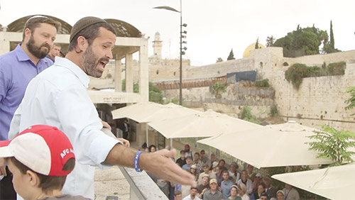 Ari and Jeremy speaking at Sukkot