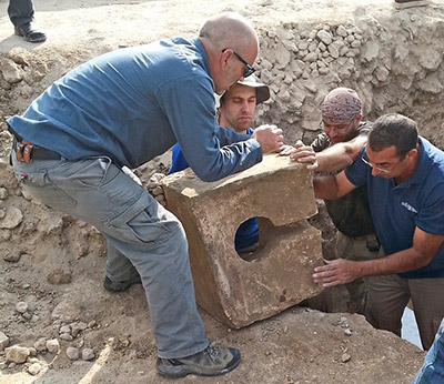 The toilet being discovered at Tel Lachish.